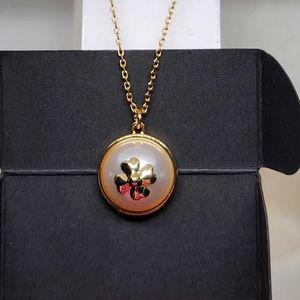Kate Spade necklace gold with spade design